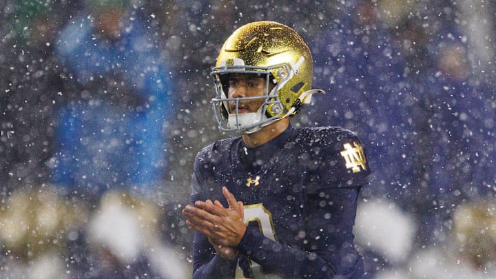 Notre Dame quarterback Kenny Minchey calls the snap during the second half of a NCAA football game against Navy at Notre Dame Stadium on Saturday, Nov. 8, 2025, in South Bend.