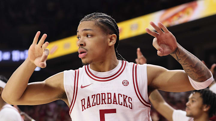 Arkansas Razorbacks guard Darius Acuff Jr (5) reacts to a teammate's made three against the Tennessee Volunteers at Bud Walton Arena on Jan 3, 2026. Arkansas Razorbacks guard Darius Acuff Jr (5) reacts to a teammate's made three against the Tennessee Volunteers at Bud Walton Arena on Jan 3, 2026.