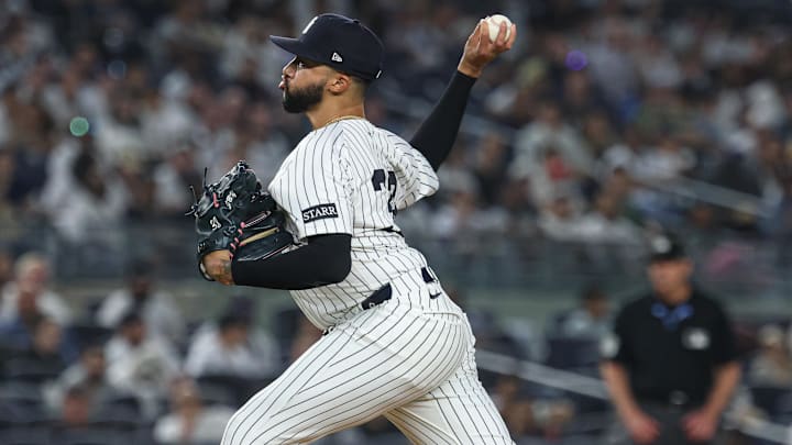 May 2, 2025; Bronx, New York, USA; New York Yankees relief pitcher Devin Williams (38) delivers a pitch during the eighth inning against the Tampa Bay Rays at Yankee Stadium. 
