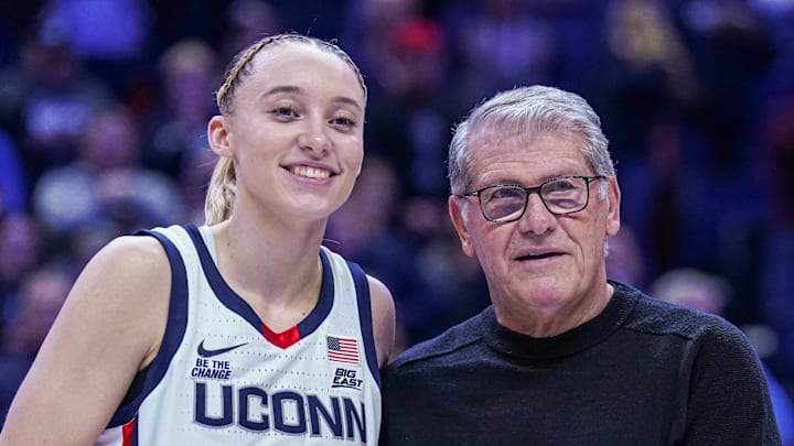 UConn Huskies guard Paige Bueckers (5) is recognized with head coach Geno Auriemma