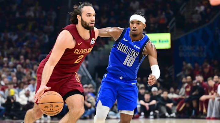 Mar 15, 2026; Cleveland, Ohio, USA; Cleveland Cavaliers guard Max Strus (2) drives to the basket against Dallas Mavericks guard Brandon Williams (10) during the second half at Rocket Arena. Mandatory Credit: Ken Blaze-Imagn Images