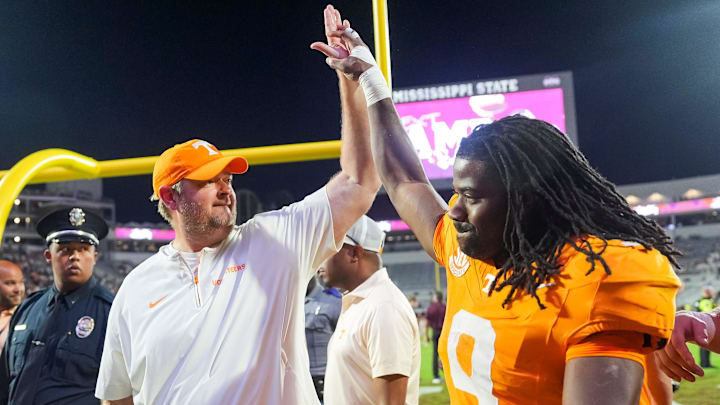 Tennessee coach Josh Heupel high fives Tennessee running back Star Thomas (9) after the Vols defeated Mississippi State in overtime at Davis Wade Stadium in Starkville, Miss., on Sept. 27, 2025.