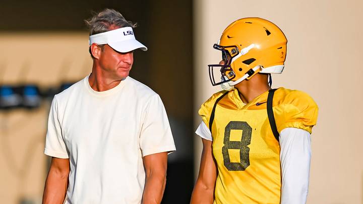 LSU football coach Lane Kiffin talks with quarterback Husan Longstreet (8) at LSU football practice on Aug. 18, 2026. LSU football coach Lane Kiffin talks with quarterback Husan Longstreet (8) at LSU football practice on Aug. 18, 2026.