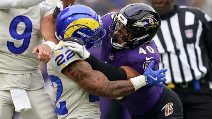 Oct 12, 2025; Baltimore, Maryland, USA; Los Angeles Rams quarterback Matthew Stafford (9) passes the ball against the Baltimore Ravens during the second quarter of the game at M&T Bank Stadium. Mandatory Credit: Mitch Stringer-Imagn Images