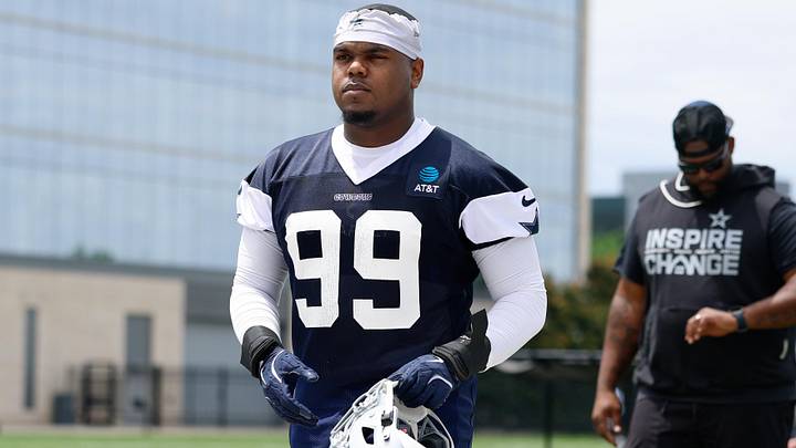 Dallas Cowboys defensive end LT Overton walks off the field after practice at the Ford Center at the Star Training Facility. Dallas Cowboys defensive end LT Overton walks off the field after practice at the Ford Center at the Star Training Facility.