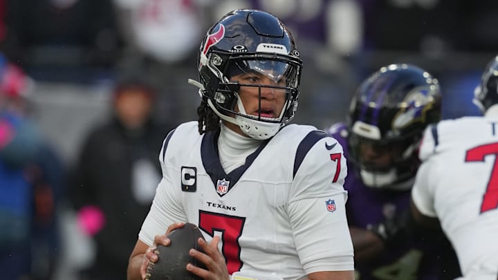 Jan 20, 2024; Baltimore, MD, USA; Houston Texans quarterback C.J. Stroud (7) drops back to pass against the Baltimore Ravens in the first half of a 2024 AFC divisional round game at M&T Bank Stadium. Mandatory Credit: Mitch Stringer-USA TODAY Sports