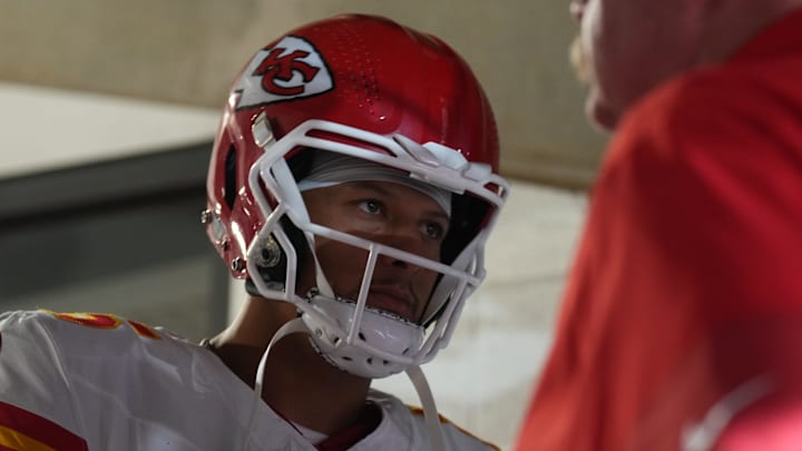 Aug 9, 2025; Glendale, Arizona, USA; Kansas City Chiefs quarterback Patrick Mahomes (15) and Kansas City Chiefs head coach Andy Reid look on during the first half at State Farm Stadium. Mandatory Credit: Joe Camporeale-Imagn Images
