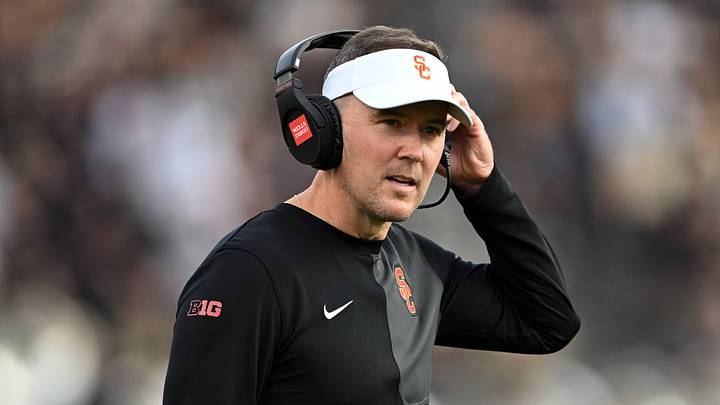 Sep 13, 2025; West Lafayette, Indiana, USA; Southern California Trojans head coach Lincoln Riley stands on the sidelines during the first quarter against the Purdue Boilermakers at Ross-Ade Stadium. Mandatory Credit: Marc Lebryk-Imagn Images Sep 13, 2025; West Lafayette, Indiana, USA; Southern California Trojans head coach Lincoln Riley stands on the sidelines during the first quarter against the Purdue Boilermakers at Ross-Ade Stadium. Mandatory Credit: Marc Lebryk-Imagn Images