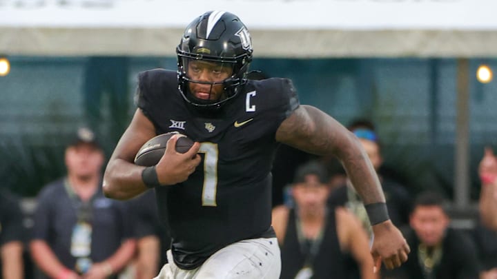 Sep 28, 2024; Orlando, Florida, USA; UCF Knights quarterback KJ Jefferson (1) runs during the second half against the Colorado Buffaloes at FBC Mortgage Stadium. Mandatory Credit: Mike Watters-Imagn Images Sep 28, 2024; Orlando, Florida, USA; UCF Knights quarterback KJ Jefferson (1) runs during the second half against the Colorado Buffaloes at FBC Mortgage Stadium. Mandatory Credit: Mike Watters-Imagn Images
