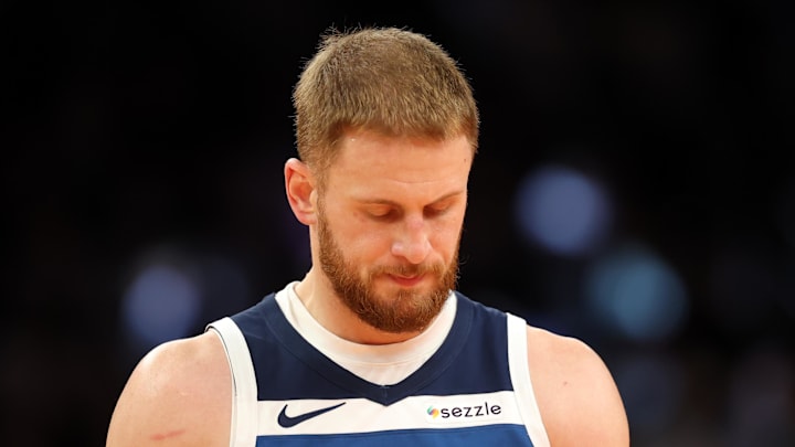 Minnesota Timberwolves guard Donte DiVincenzo (0) reacts against the Phoenix Suns during an NBA Cup game at Mortgage Matchup Center on November 21, 2025.
