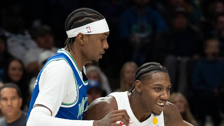 Toronto Raptors forward RJ Barrett dribbles the ball past Minnesota Timberwolves forward Jaden McDaniels. Toronto Raptors forward RJ Barrett dribbles the ball past Minnesota Timberwolves forward Jaden McDaniels.