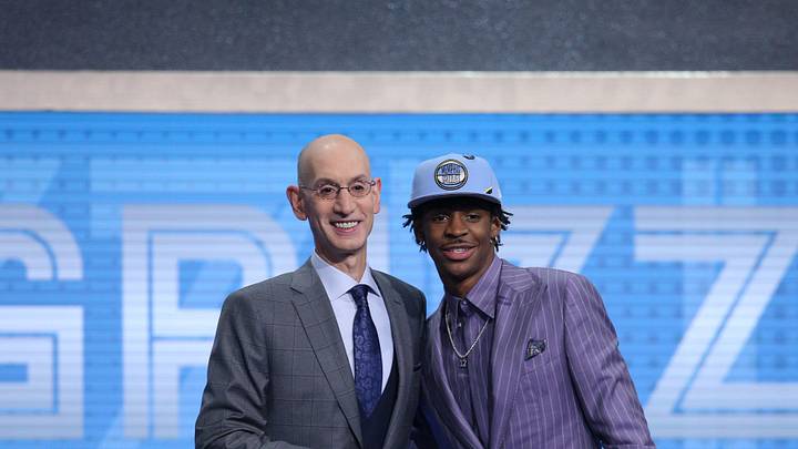 Jun 20, 2019; Brooklyn, NY, USA; Ja Morant (Murray State) greets NBA commissioner Adam Silver after being selected as the number two overall pick for the Memphis Grizzlies in the first round of the 2019 NBA Draft at Barclays Center. Mandatory Credit: Brad Penner-Imagn Images