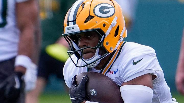 Green Bay Packers running back MarShawn Lloyd carries the ball during OTAs. Green Bay Packers running back MarShawn Lloyd carries the ball during OTAs.