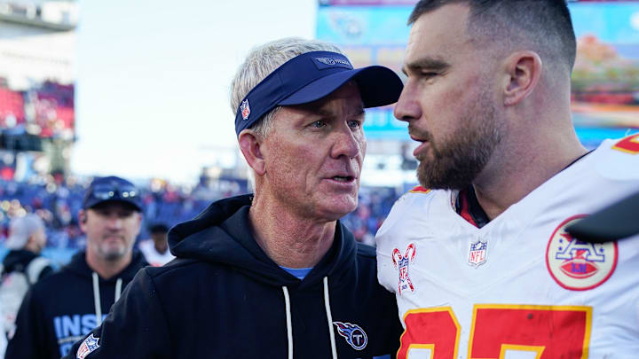 Tennessee Titans interim coach Mike McCoy talks to Kansas City Chiefs tight end Travis Kelce (87) after the game at Nissan Stadium in Nashville, Tenn., Sunday, Dec. 21, 2025.