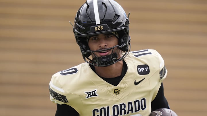 Apr 11, 2026; Boulder, CO, USA; Colorado Buffaloes quarterback Julian Lewis (10) rushes with the ball during the spring game at Folsom Field. Apr 11, 2026; Boulder, CO, USA; Colorado Buffaloes quarterback Julian Lewis (10) rushes with the ball during the spring game at Folsom Field.