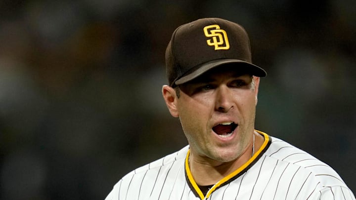 Padres pitcher Craig Stammen (34) reacts after the third out in the tenth inning against the Los Angeles Dodgers at Petco Park on Aug. 25, 2021.