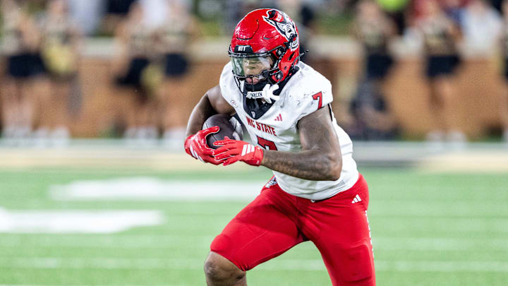 Sep 11, 2025; Winston-Salem, North Carolina, USA;  North Carolina State Wolfpack tight end Justin Joly (7) catches a pass against the Wake Forest Demon Deacons in second half at Allegacy Federal Credit Union Stadium. Images