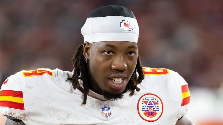 Aug 9, 2025; Glendale, Arizona, USA; Kansas City Chiefs offensive tackle Wanya Morris (64) against the Arizona Cardinals during a preseason NFL game at State Farm Stadium. Mandatory Credit: Mark J. Rebilas-Imagn Images