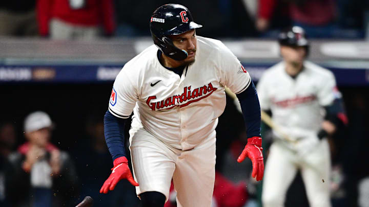 Oct 18, 2024; Cleveland, Ohio, USA; Cleveland Guardians first baseman Josh Naylor (22) hits a two RBI double in the seventh inning against the New York Yankees during game four of the ALCS for the 2024 MLB playoffs at Progressive Field. Mandatory Credit: David Dermer-Imagn Images