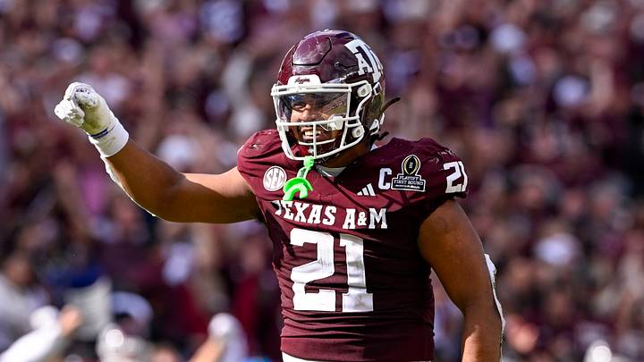 Dec 20, 2025; College Station, TX, USA; Texas A&M Aggies linebacker Taurean York (21) celebrates during the game between the Aggies and the Hurricanes at Kyle Field. Mandatory Credit: Jerome Miron-Imagn Images