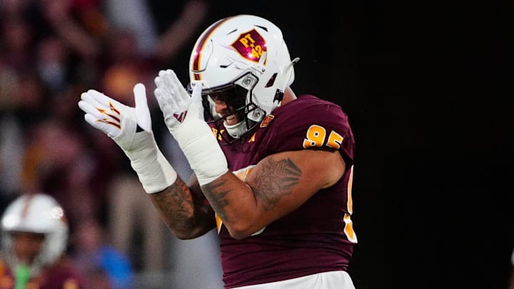 ASU defensive lineman Justin Wodtly (95) celebrates a third down stop against UCF during a game at Mountain America Stadium in Tempe on Nov. 9, 2024.