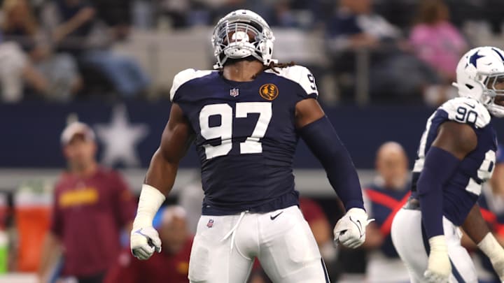 Dallas Cowboys defensive tackle Osa Odighizuwa (97) celebrates a sack in the second half against the Washington Commanders.