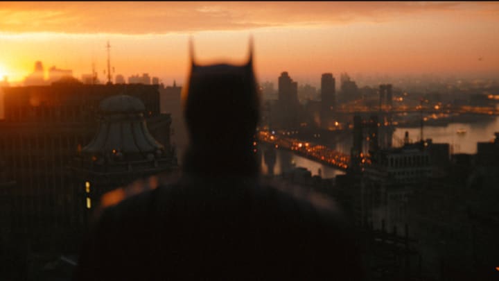 ROBERT PATTINSON as Batman in Warner Bros. Pictures’ action adventure “THE BATMAN,” a Warner Bros. Pictures release. Courtesy of Warner Bros. Pictures/ ™ & © DC Comics. Pictures release. © 2021 Warner Bros. Entertainment Inc. All Rights Reserved.
