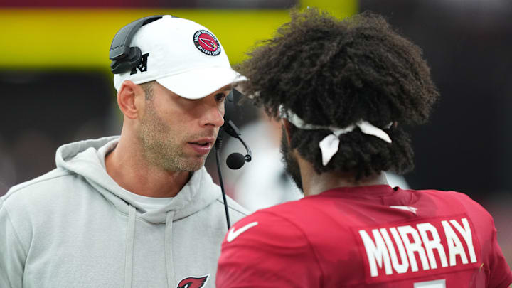 Sep 15, 2024; Glendale, Arizona, USA; Arizona Cardinals head coach Jonathan Gannon talks with Arizona Cardinals quarterback Kyler Murray (1) during the second half against the Los Angeles Rams at State Farm Stadium. Mandatory Credit: Joe Camporeale-Imagn Images Sep 15, 2024; Glendale, Arizona, USA; Arizona Cardinals head coach Jonathan Gannon talks with Arizona Cardinals quarterback Kyler Murray (1) during the second half against the Los Angeles Rams at State Farm Stadium. Mandatory Credit: Joe Camporeale-Imagn Images