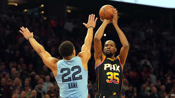 Feb 11, 2025; Phoenix, Arizona, USA; Phoenix Suns forward Kevin Durant (35) shoots over Memphis Grizzlies guard Desmond Bane (22) during the first half at Footprint Center. Mandatory Credit: Joe Camporeale-Imagn Images Feb 11, 2025; Phoenix, Arizona, USA; Phoenix Suns forward Kevin Durant (35) shoots over Memphis Grizzlies guard Desmond Bane (22) during the first half at Footprint Center. Mandatory Credit: Joe Camporeale-Imagn Images