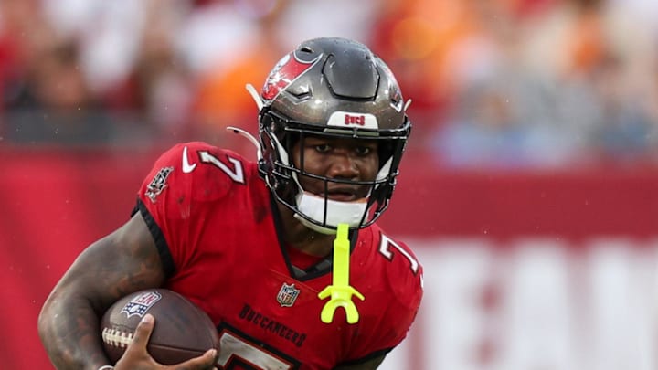 Tampa Bay Buccaneers running back Bucky Irving (7) runs with the ball against the Carolina Panthers