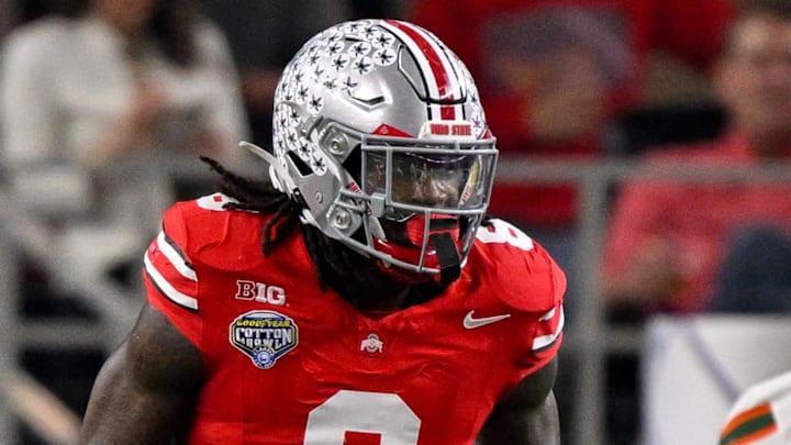 Dec 31, 2025; Arlington, TX, USA; Ohio State Buckeyes linebacker Arvell Reese (8) gets into position during the 2025 Cotton Bowl and quarterfinal game of the College Football Playoff at AT&T Stadium. Mandatory Credit: Jerome Miron-Imagn Images