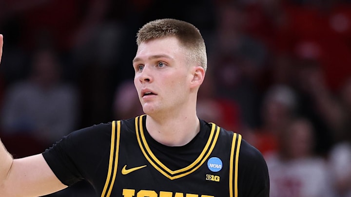 Mar 26, 2026; Houston, TX, USA;Iowa Hawkeyes guard Bennett Stirtz (14) dribbles the ball against the Nebraska Cornhuskers in the first half during a Sweet Sixteen game of the South Regional of the men's 2026 NCAA Tournament at Toyota Center. Mandatory Credit: Troy Taormina-Imagn Images Mar 26, 2026; Houston, TX, USA;Iowa Hawkeyes guard Bennett Stirtz (14) dribbles the ball against the Nebraska Cornhuskers in the first half during a Sweet Sixteen game of the South Regional of the men's 2026 NCAA Tournament at Toyota Center. Mandatory Credit: Troy Taormina-Imagn Images