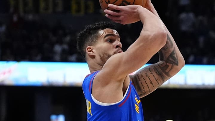 May 3, 2025; Denver, Colorado, USA; Denver Nuggets forward Michael Porter Jr. (1) lines up a three point score in the third quarter against the LA Clippers during game seven of first round for the 2025 NBA Playoffs at Ball Arena. Mandatory Credit: Ron Chenoy-Imagn Images May 3, 2025; Denver, Colorado, USA; Denver Nuggets forward Michael Porter Jr. (1) lines up a three point score in the third quarter against the LA Clippers during game seven of first round for the 2025 NBA Playoffs at Ball Arena. Mandatory Credit: Ron Chenoy-Imagn Images