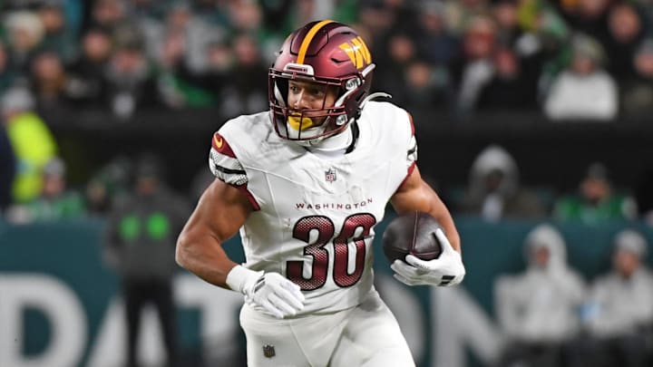 Nov 14, 2024; Philadelphia, Pennsylvania, USA; Washington Commanders running back Austin Ekeler (30) against the Philadelphia Eagles at Lincoln Financial Field. Mandatory Credit: Eric Hartline-Imagn Images