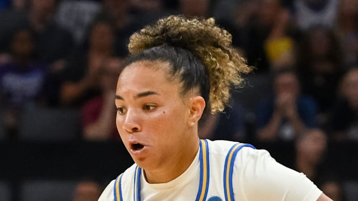 Mar 27, 2026; Sacramento, CA, USA; UCLA Bruins guard Kiki Rice (1) controls the ball against the Minnesota Golden Gophers during a Sweet Sixteen game of the Sacramento Regional 2 of the women's 2026 NCAA Tournament at Golden 1 Center. Mandatory Credit: Ed Szczepanski-Imagn Images