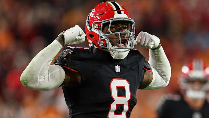 Dec 11, 2025; Tampa, Florida, USA; Atlanta Falcons tight end Kyle Pitts Sr. (8) reacts after catching a pass against the Tampa Bay Buccaneers during the second quarter at Raymond James Stadium.