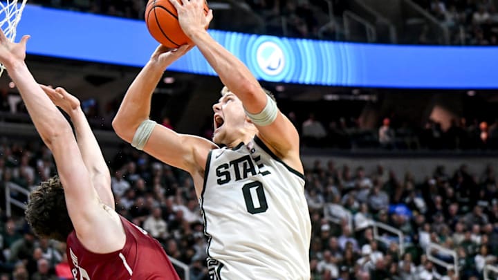 Michigan State's Jaxon Kohler, right, is fouled while making a basket against Colgate during the second half on Monday, Nov. 3, 2025, at the Breslin Center in East Lansing.