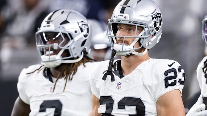 Aug 23, 2025; Glendale, Arizona, USA; Las Vegas Raiders running back Dylan Laube (23) against the Arizona Cardinals during a preseason NFL game at State Farm Stadium. Mandatory Credit: Mark J. Rebilas-Imagn Images