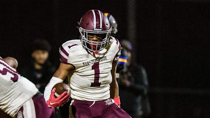 Harper Woods' Dakota Guerrant powers into the end zone during the Division 4 football district semifinal on Saturday, Nov. 2, 2024, at Bob Atkins Field.