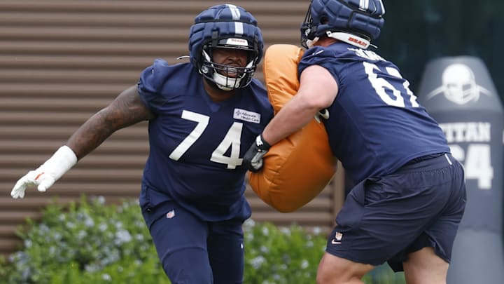 Jun 3, 2025; Lake Forest, IL, USA; Chicago Bears guard Jordan McFadden (74) warms up during minicamp at Halas Hall.