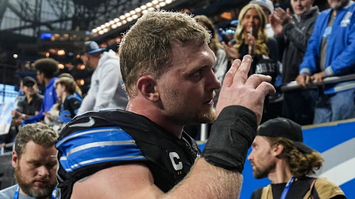 Detroit Lions defensive end Aidan Hutchinson (97) waves at fans to celebrate 34-27 win over New York Giants 