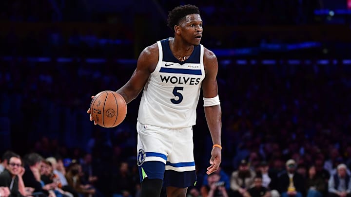 Mar 10, 2026; Los Angeles, California, USA; Minnesota Timberwolves guard Anthony Edwards (5) controls the ball against the Los Angeles Lakers during the second half at Crypto.com Arena.