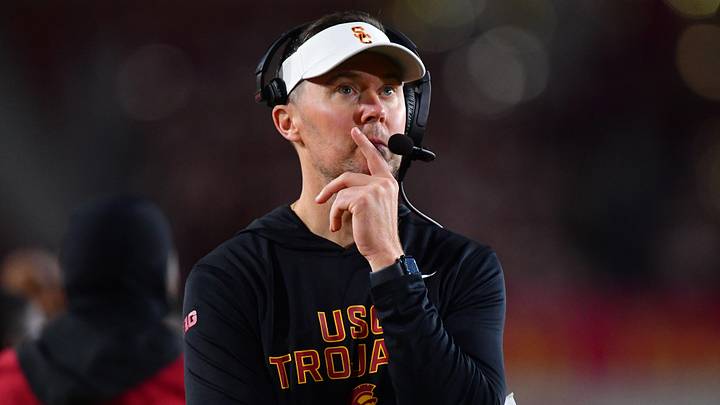 Nov 7, 2025; Los Angeles, California, USA; Southern California Trojans head coach Lincoln Riley watches game action against the Northwestern Wildcats during the second half at the Los Angeles Memorial Coliseum. Mandatory Credit: Gary A. Vasquez-Imagn Images Nov 7, 2025; Los Angeles, California, USA; Southern California Trojans head coach Lincoln Riley watches game action against the Northwestern Wildcats during the second half at the Los Angeles Memorial Coliseum. Mandatory Credit: Gary A. Vasquez-Imagn Images