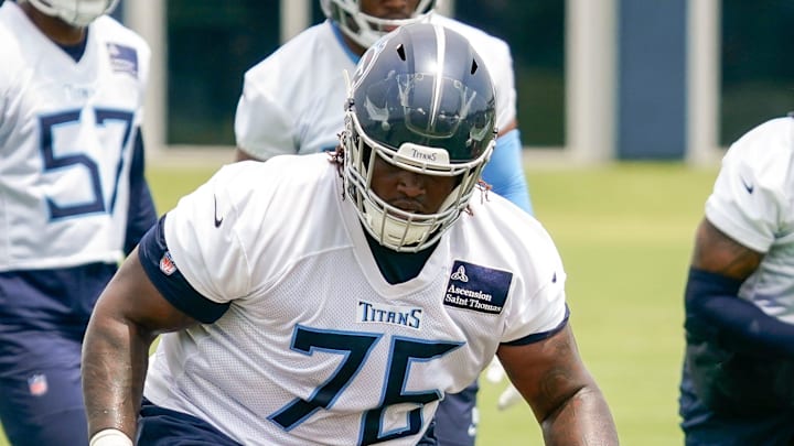 Tennessee Titans nose tackle Isaiah Raikes runs drills during minicamp practice.