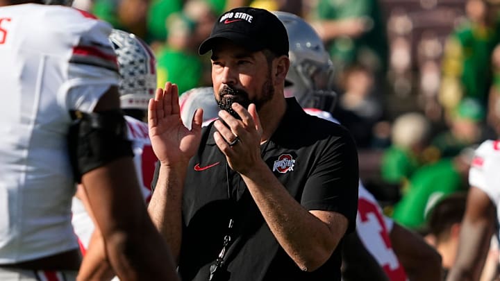 Ohio State Buckeyes head coach Ryan Day leads warm ups prior to the College Football Playoff quarterfinal against the Oregon Ducks at the Rose Bowl in Pasadena, Calif. on Jan. 1, 2025.