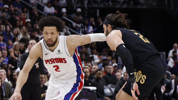 May 5, 2026; Detroit, Michigan, USA; Detroit Pistons guard Cade Cunningham (2) dribbles defended by Cleveland Cavaliers guard Max Strus (2) in the second half during game one of the second round of the 2026 NBA Playoffs at Little Caesars Arena. Mandatory Credit: Rick Osentoski-Imagn Images