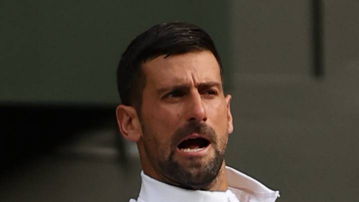 Novak Djokovic hits a forehand at Wimbledon