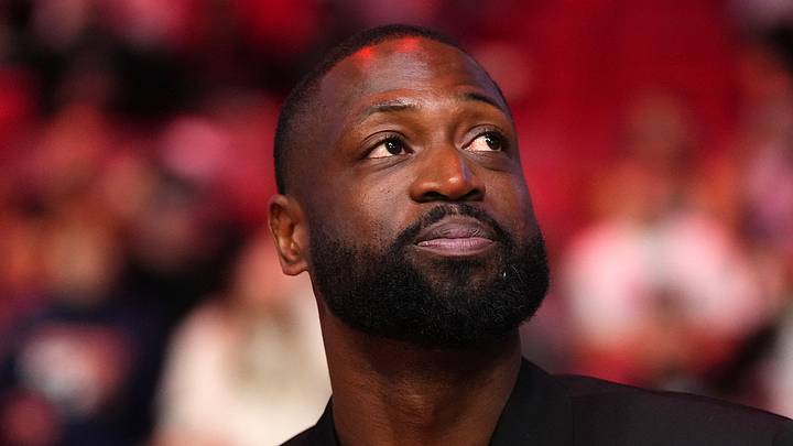 Jan 14, 2024; Miami, Florida, USA; Former Miami Heat player Dwayne Wade reacts after learning a statue will be erected outside of Kaseya Center in 2025, during a special ceremony during halftime of the game between the Miami Heat and the Charlotte Hornets. Mandatory Credit: Jasen Vinlove-USA TODAY Sports Jan 14, 2024; Miami, Florida, USA; Former Miami Heat player Dwayne Wade reacts after learning a statue will be erected outside of Kaseya Center in 2025, during a special ceremony during halftime of the game between the Miami Heat and the Charlotte Hornets. Mandatory Credit: Jasen Vinlove-USA TODAY Sports