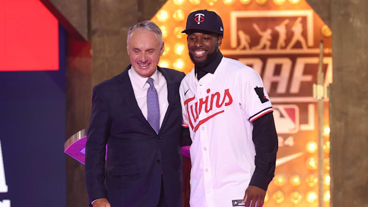 Jul 14, 2024; Ft. Worth, TX, USA;  MLB Commissioner Rob Manfred takes a photo with Kaelen Culpepper after he was drafted by the Minnesota Twins with the 21st pick during the first round of the MLB Draft at Cowtown Coliseum.