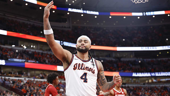 Nov 19, 2025; Chicago, Illinois, USA; Illinois Fighting Illini guard Kylan Boswell (4) reacts during the second half at United Center. Mandatory Credit: Kamil Krzaczynski-Imagn Images